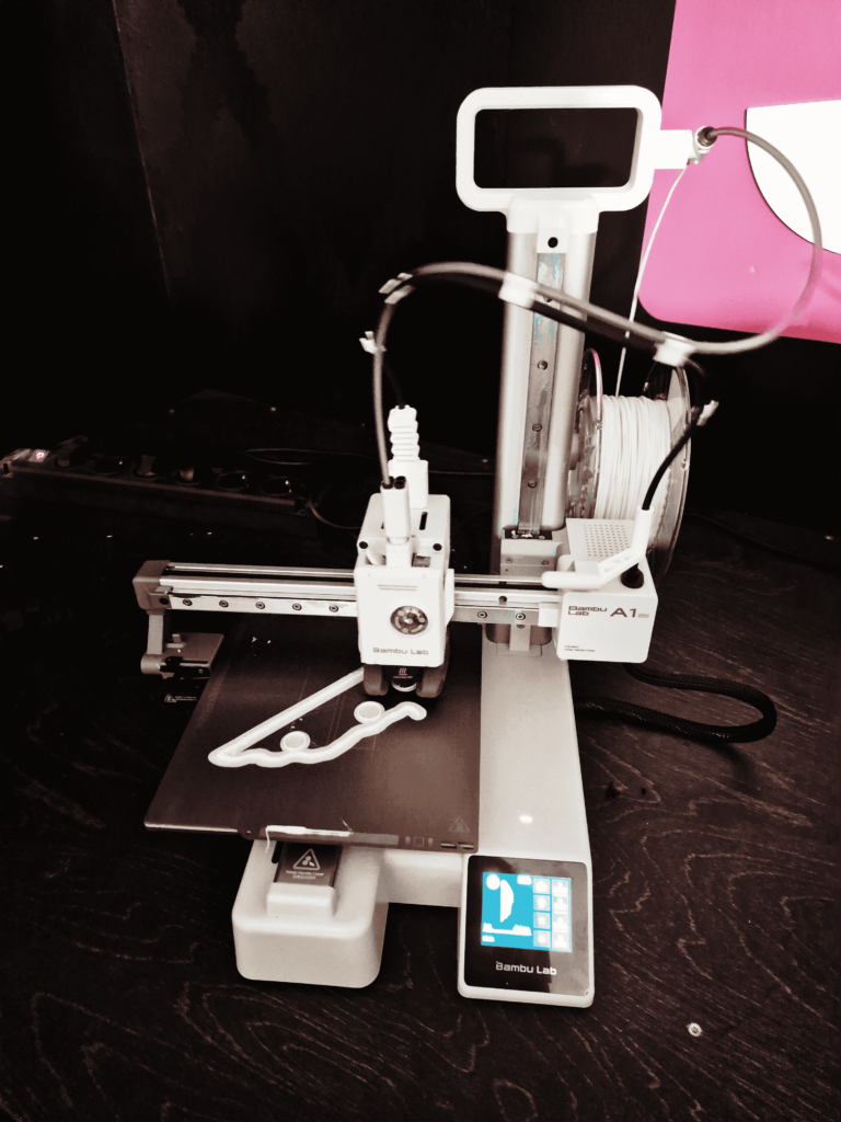 Bambu Lab A1 Mini, one of the Best 3D Printers for beginners, printing a model with PLA PETG 3D Printer setup