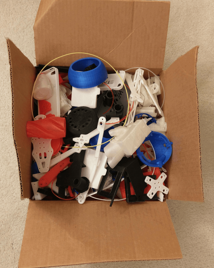Pile of colorful failed 3D prints illustrating plastic waste from 3D printing ready to go to filament recycler.