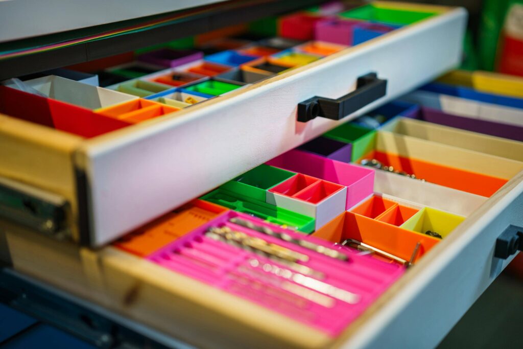 PLA filament used in home & office prints - small organisers for various tools and accessories in shelves.