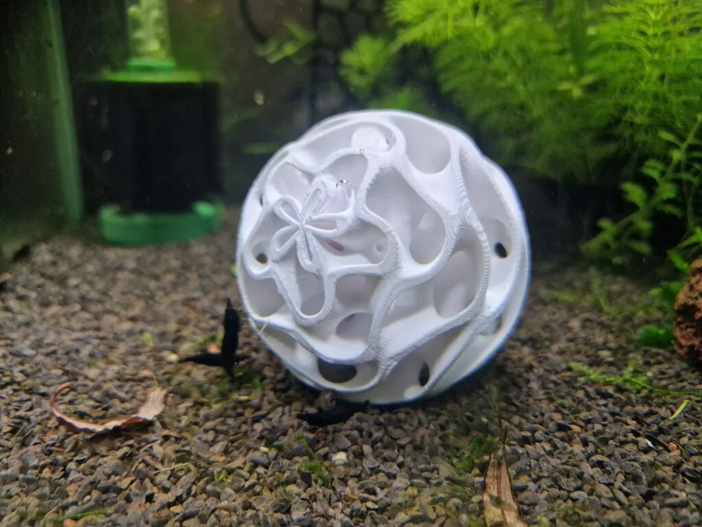 A gyroid shrimp sphere in shrimp tank. A design and 3d print by Aquireef3D.