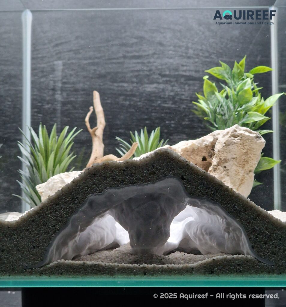 3d printed elephant nose cave design by Aquireef3D. Specially made for smaller fish like guppies - big openings provide natural and good observation.